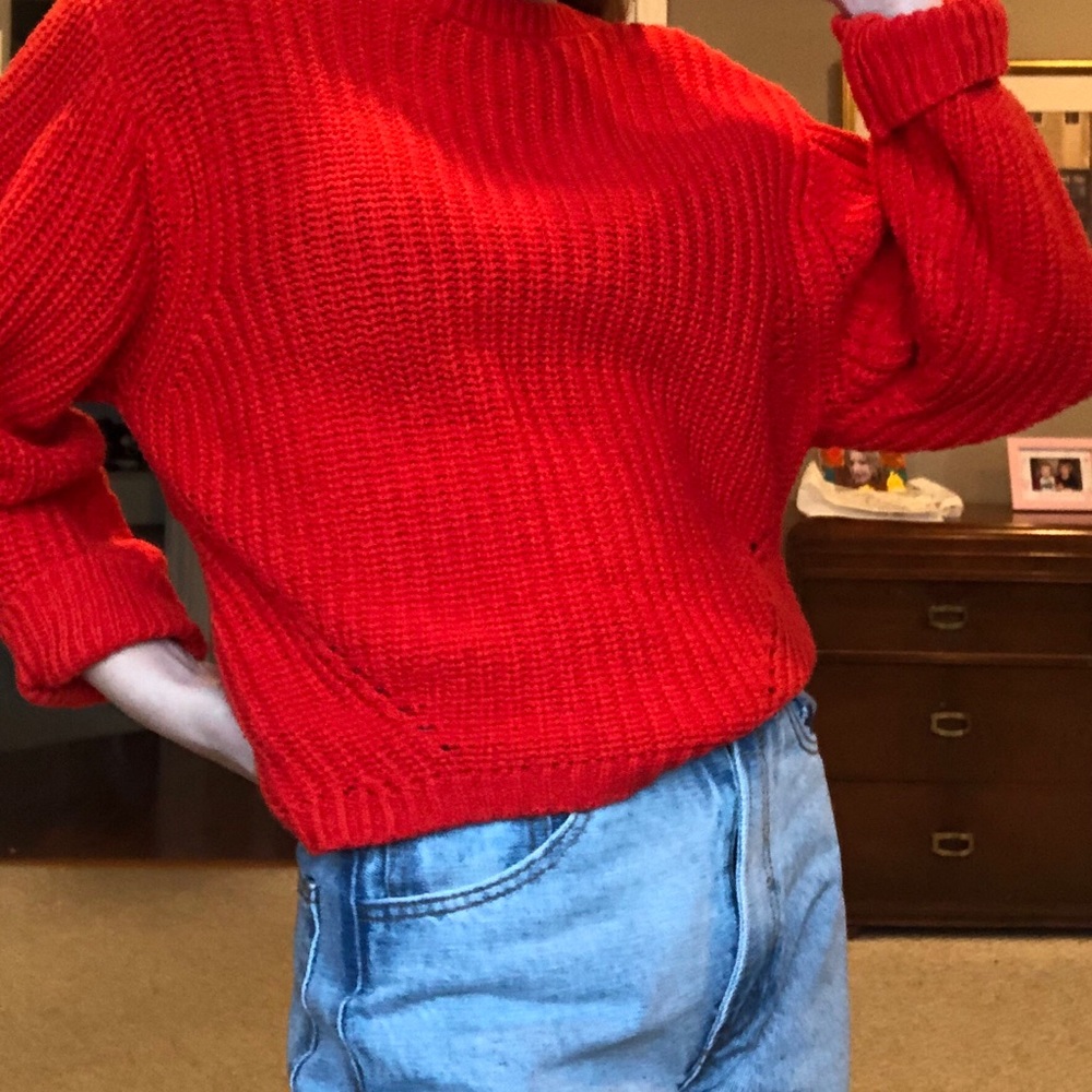 Red knitted sweater